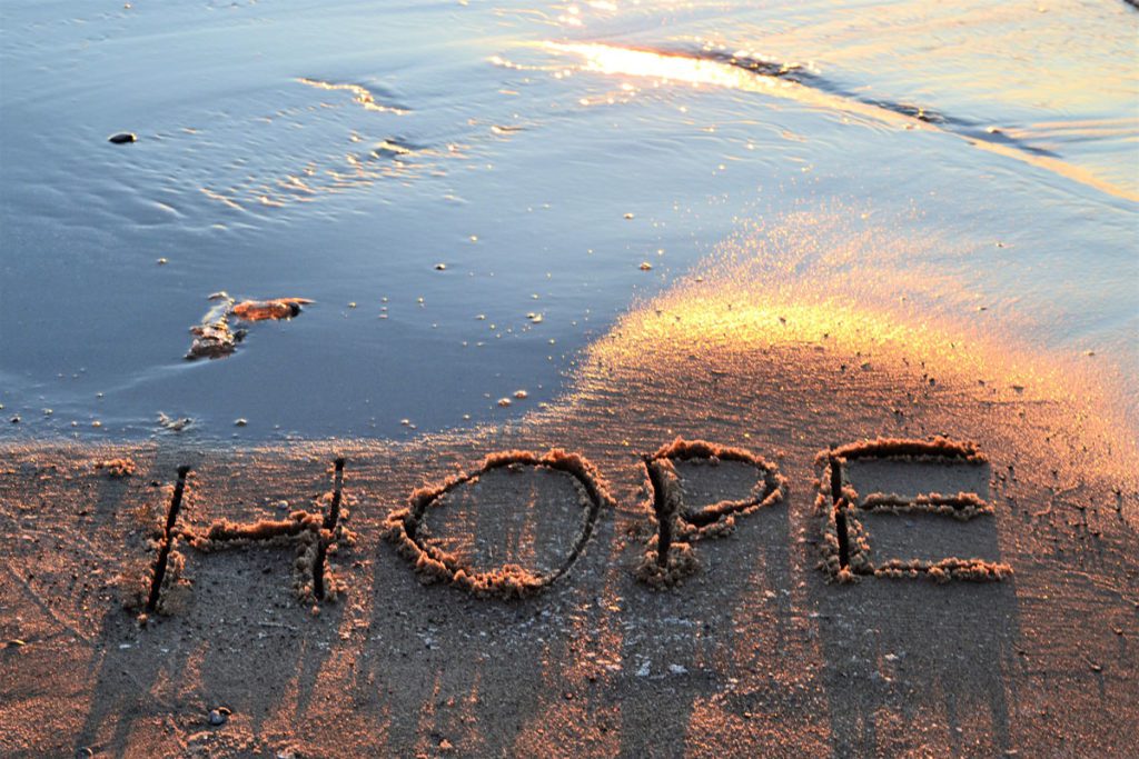 the-word-hope-written-in-the-sand-on-the-beach-at-2022-11-16-06-12-42-utc